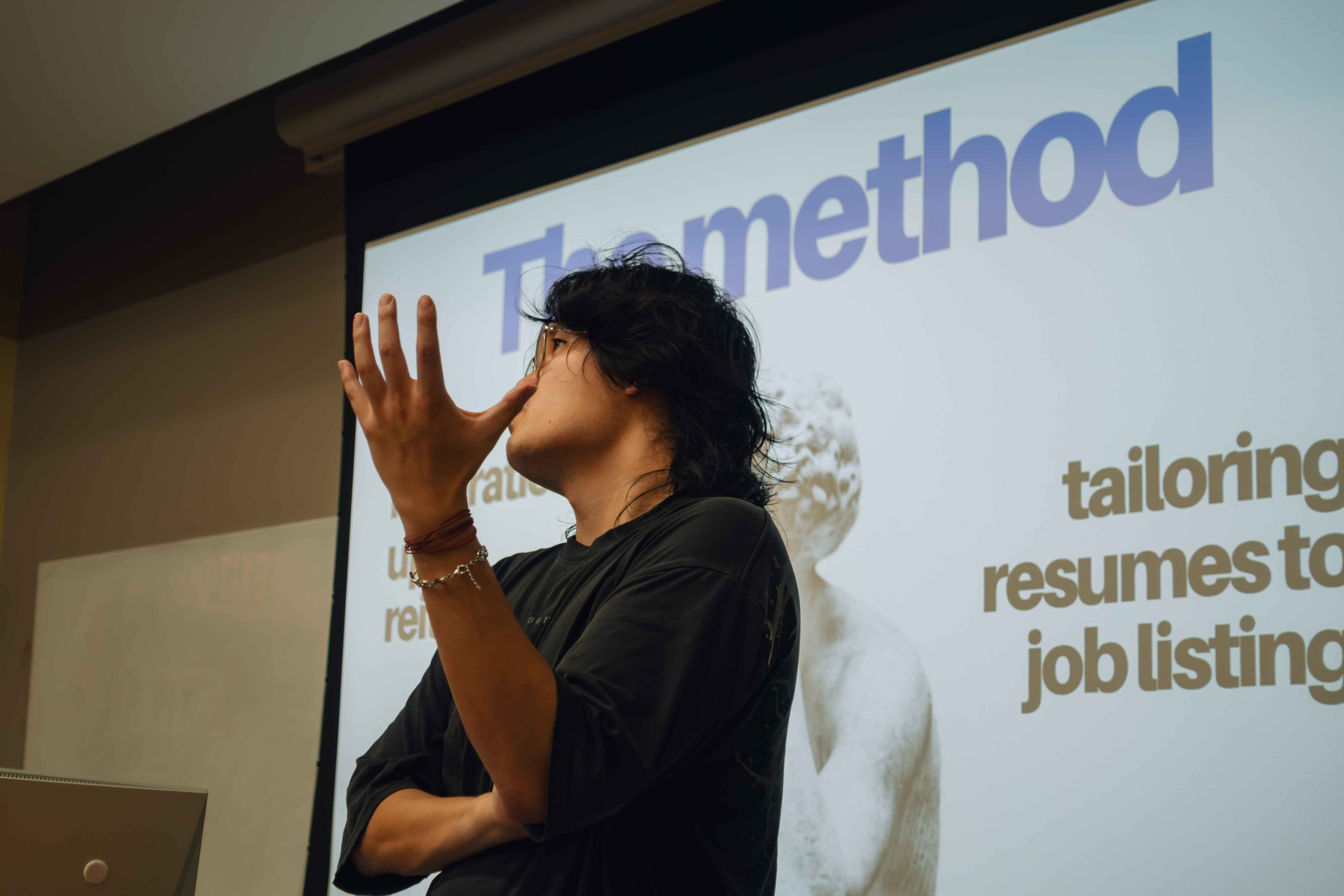 a resume and laptop on a desk, representing the gitpaid job-hunting guide