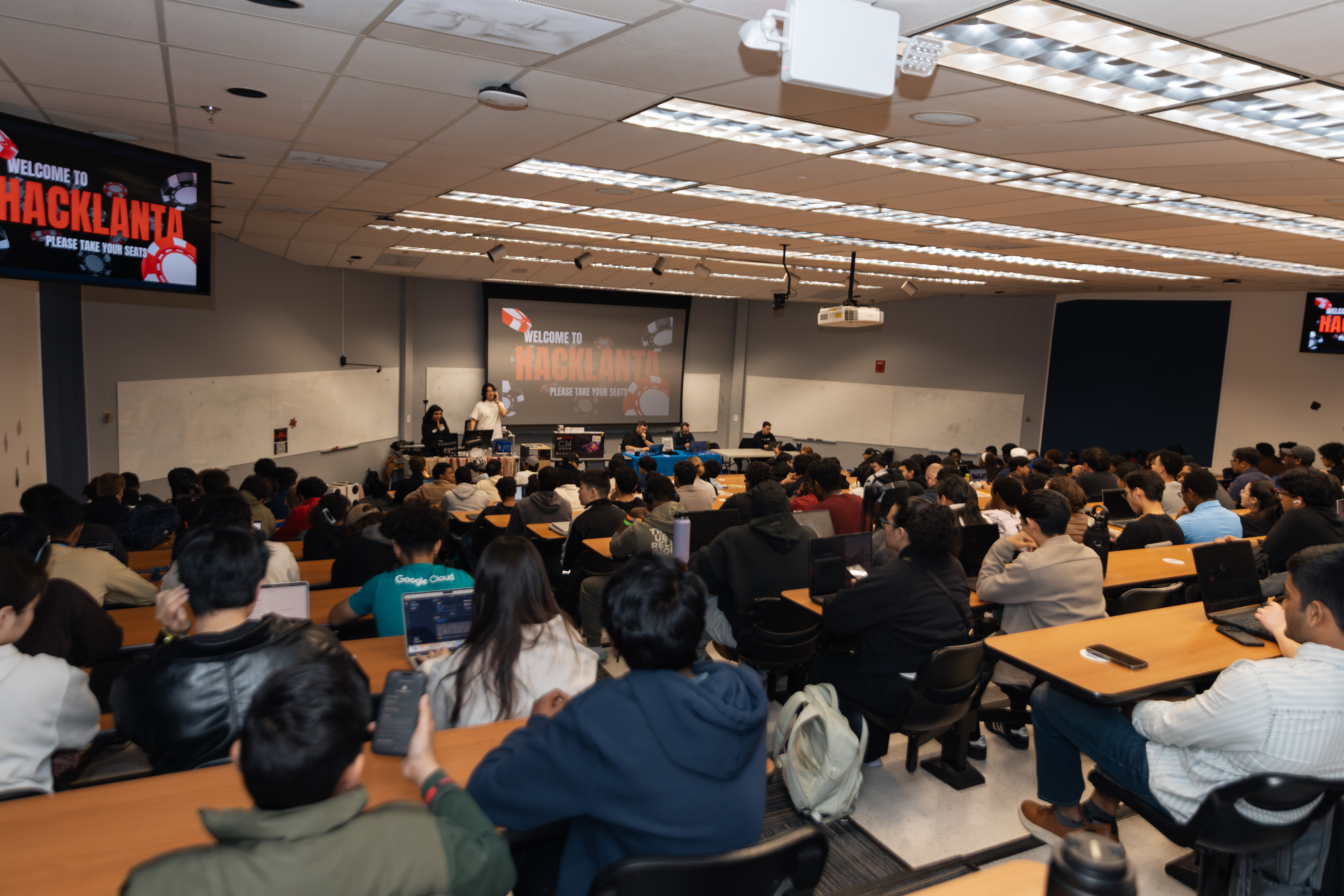 students collaborating at the hacklanta hackathon